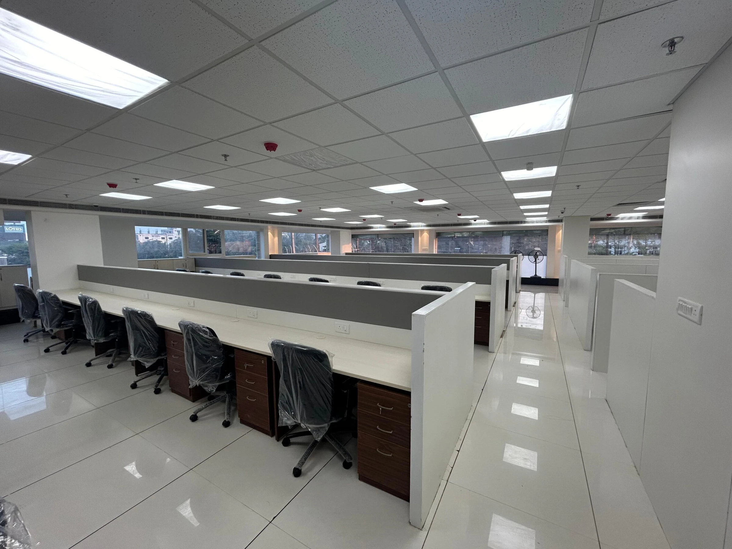 Open-plan bank interior with workstations at Axis Bank, Scheme 140, Indore
